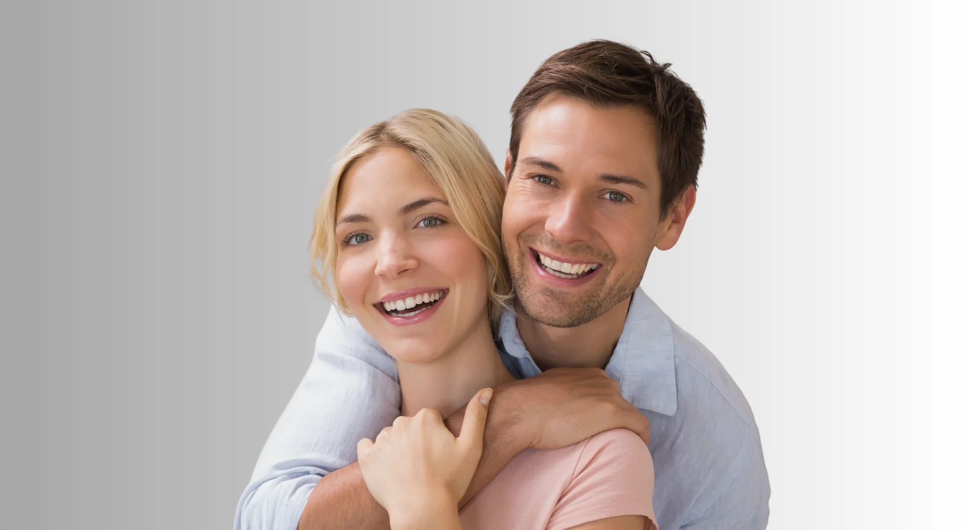 Smiling patients at Studio City Dental Group